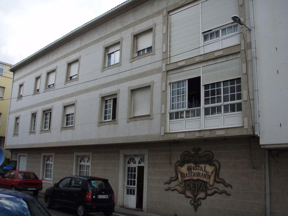 Hostal Restaurante La Cepa Carino Exterior photo
